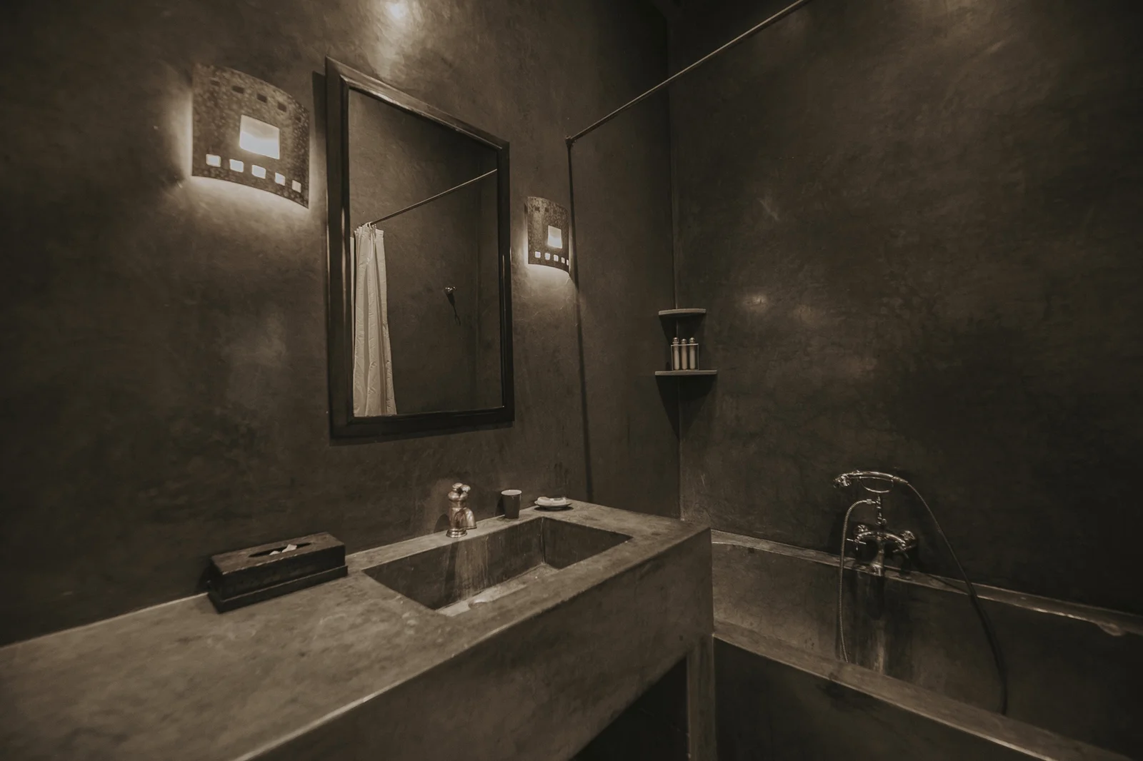 The Carbone Deluxe Room at Dar Zelda, in charcoal tones with a fireplace — view 6
