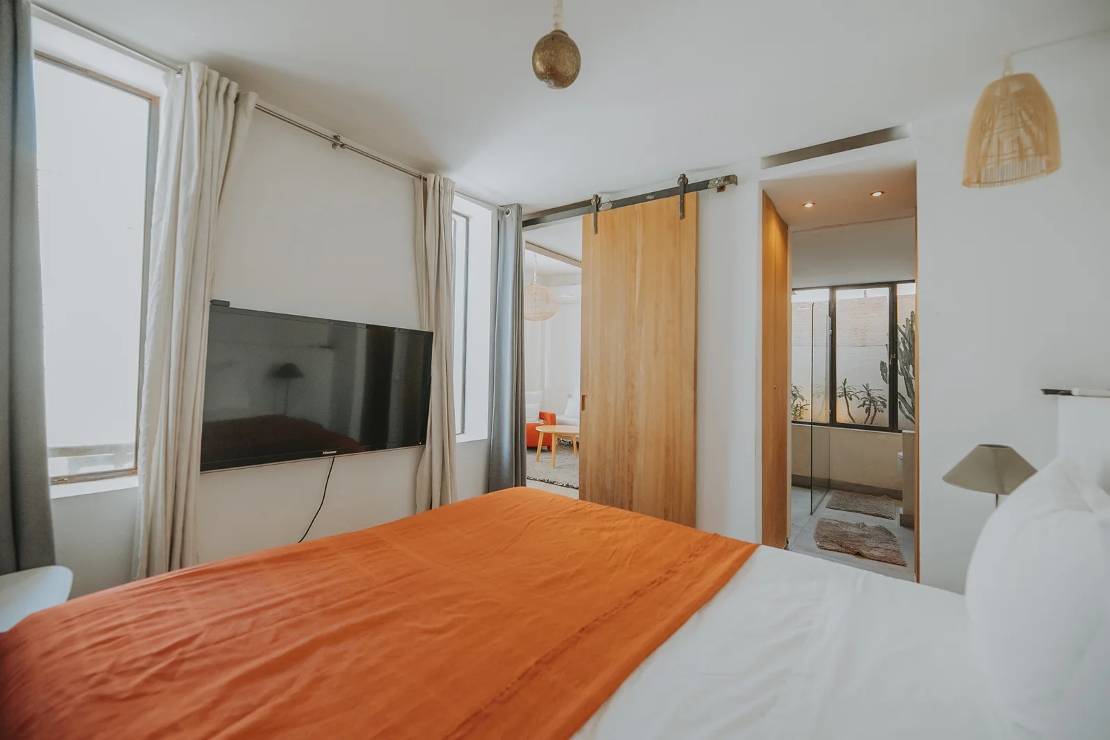 The light-filled living room of the Designer's Apartment at Dar Zelda, opening onto its terrace — view 5
