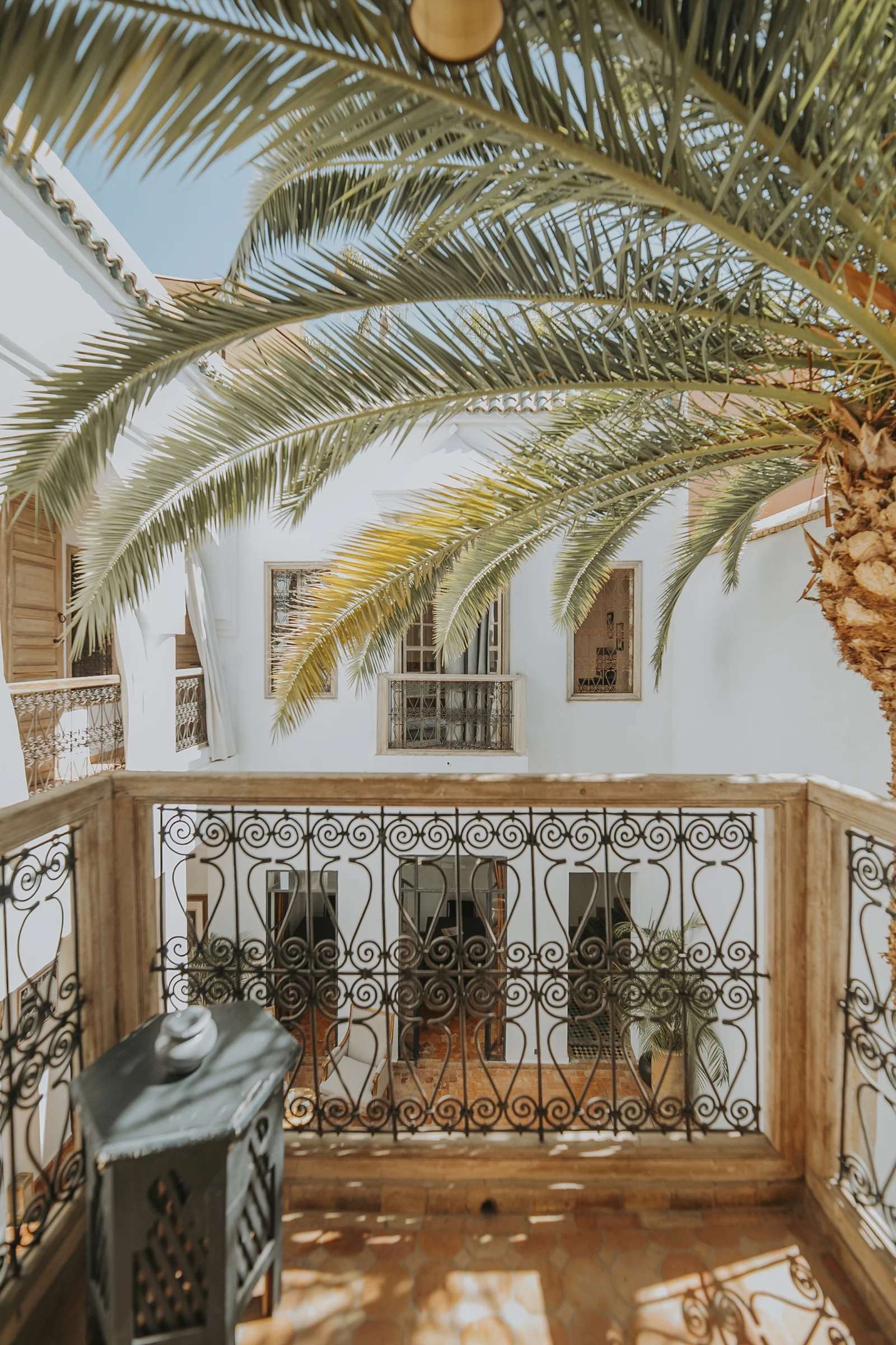 The Vegetale Standard Room at Dar Zelda and its balcony over the flowering courtyard — view 4