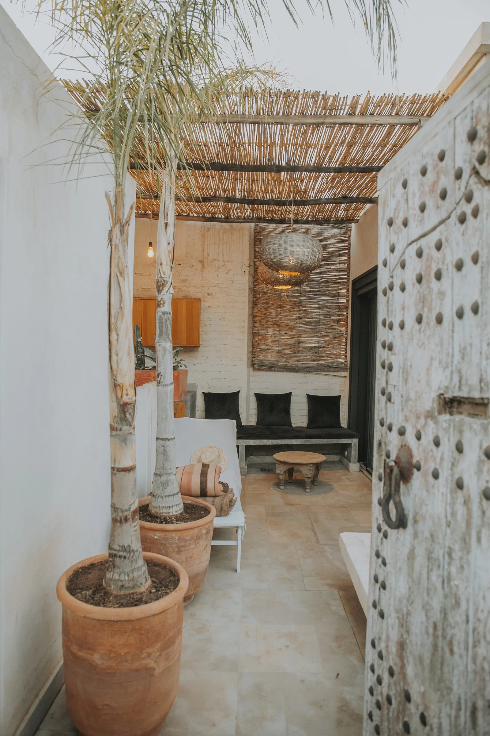 The light-filled living room of the Designer's Apartment at Dar Zelda, opening onto its terrace — view 4